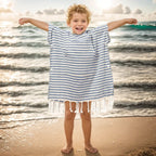 Kinder-Poncho gestreift mit Zotteln